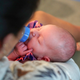 Emma feeds her newborn baby, Story, at Winchester Medical Center.
